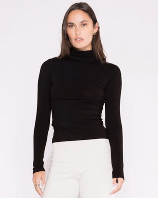 Black Turtleneck Ripley Rader